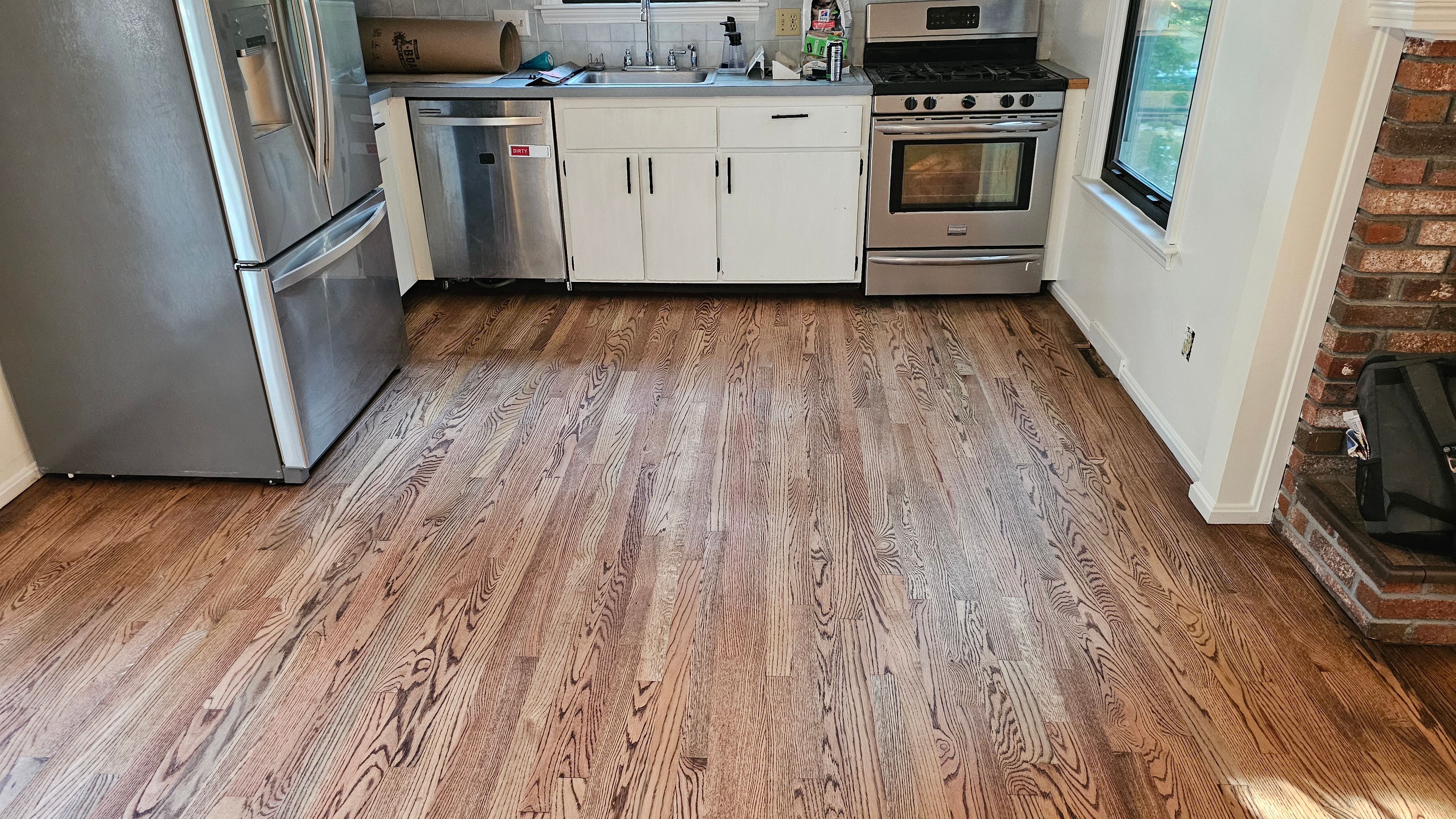 Kitchen floor refinishing — MetroWest project by Absolute Design Build