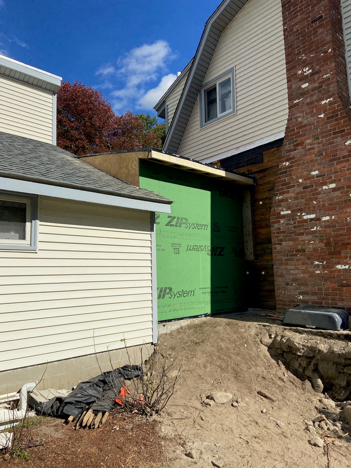 Bathroom extension framing in progress — exterior view, Hopkinton MA