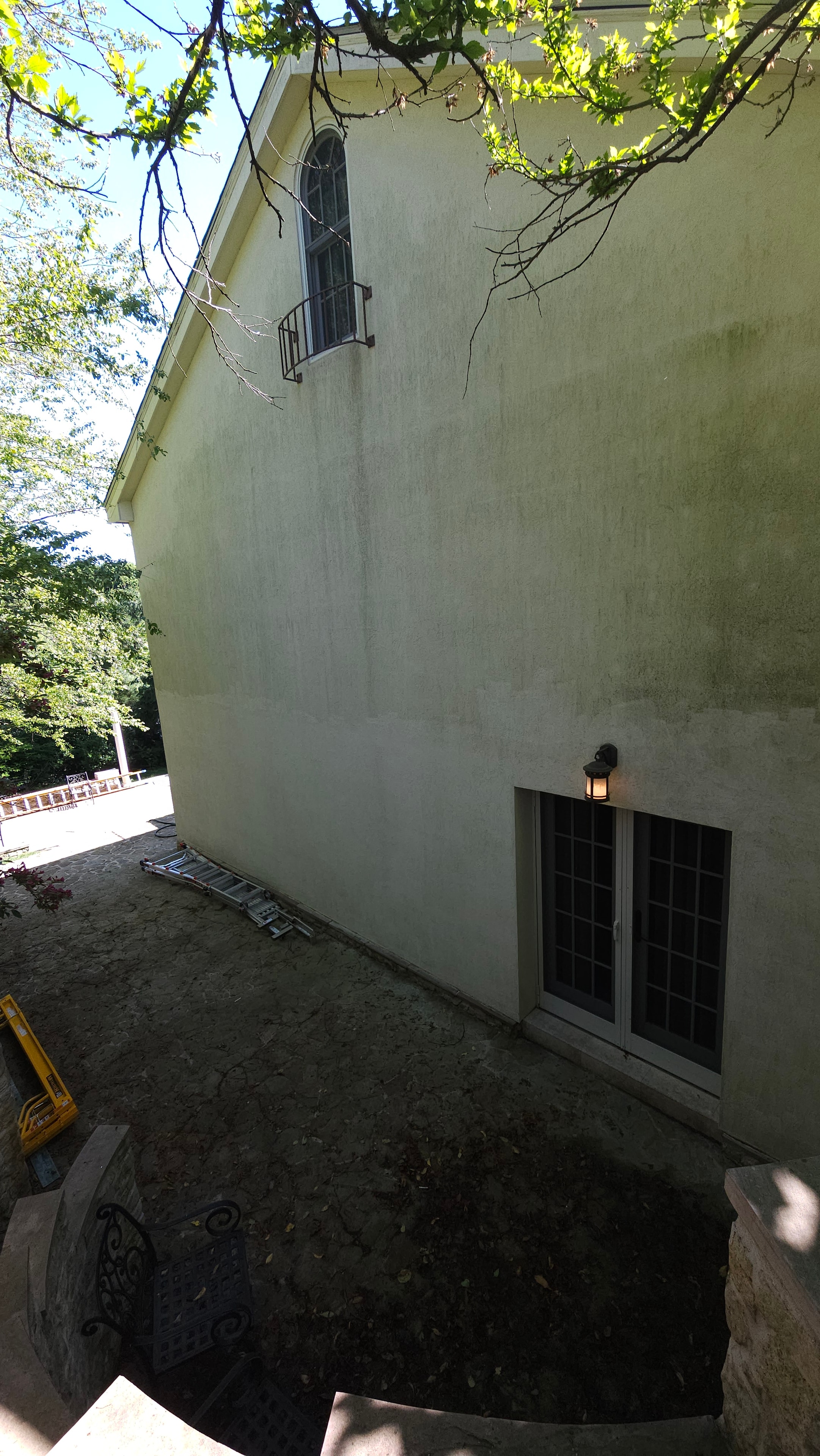 Side wall stucco condition before painting