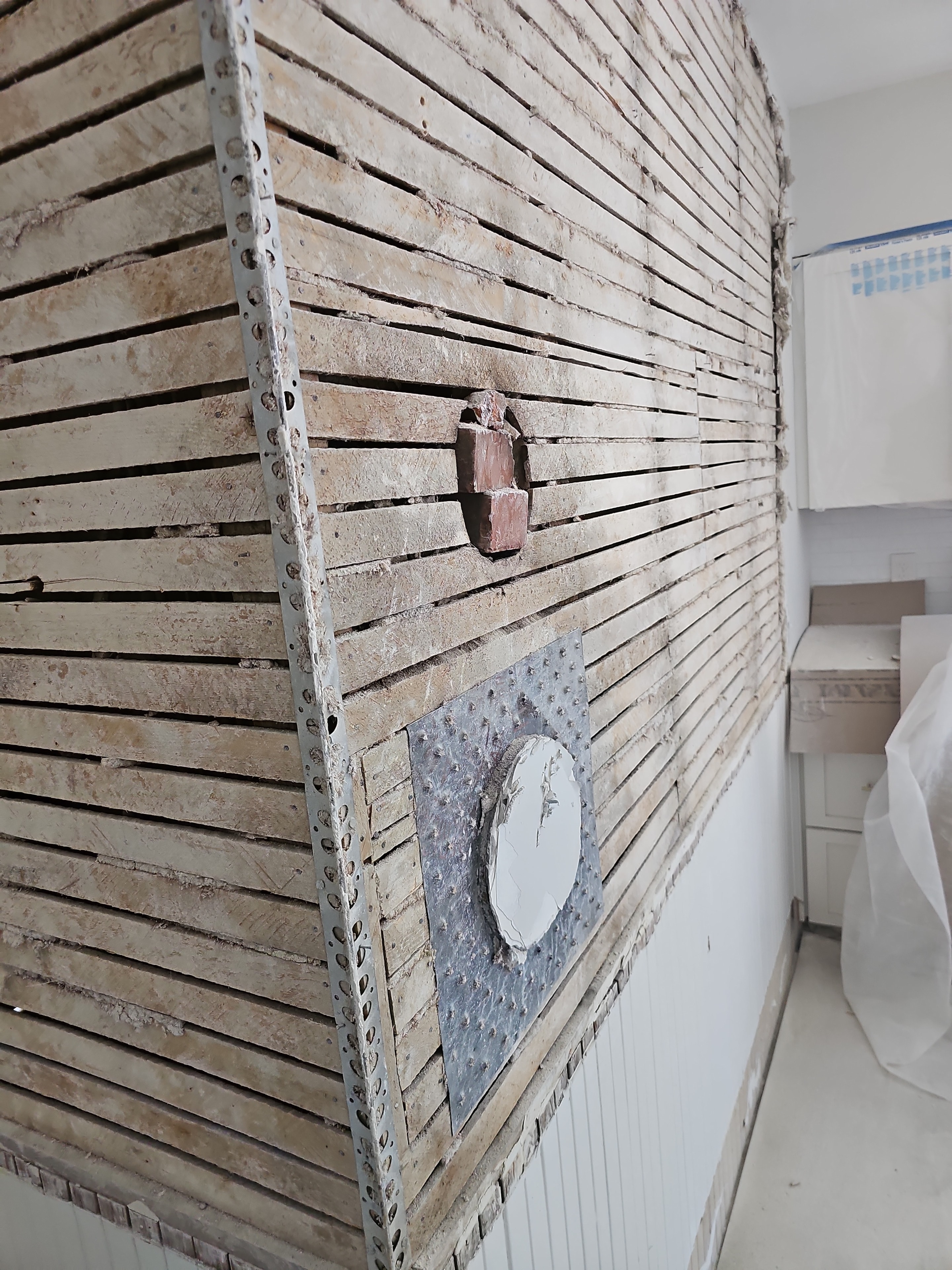 Plaster and lath removal during kitchen renovation — West Roxbury, MA