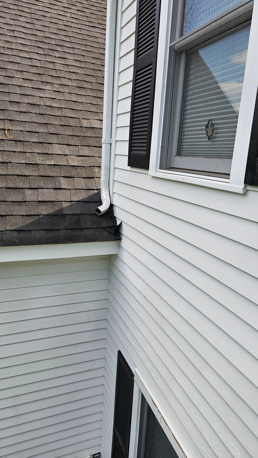 Repaired fascia and soffit with clean white finish after restoration — Weston, MA