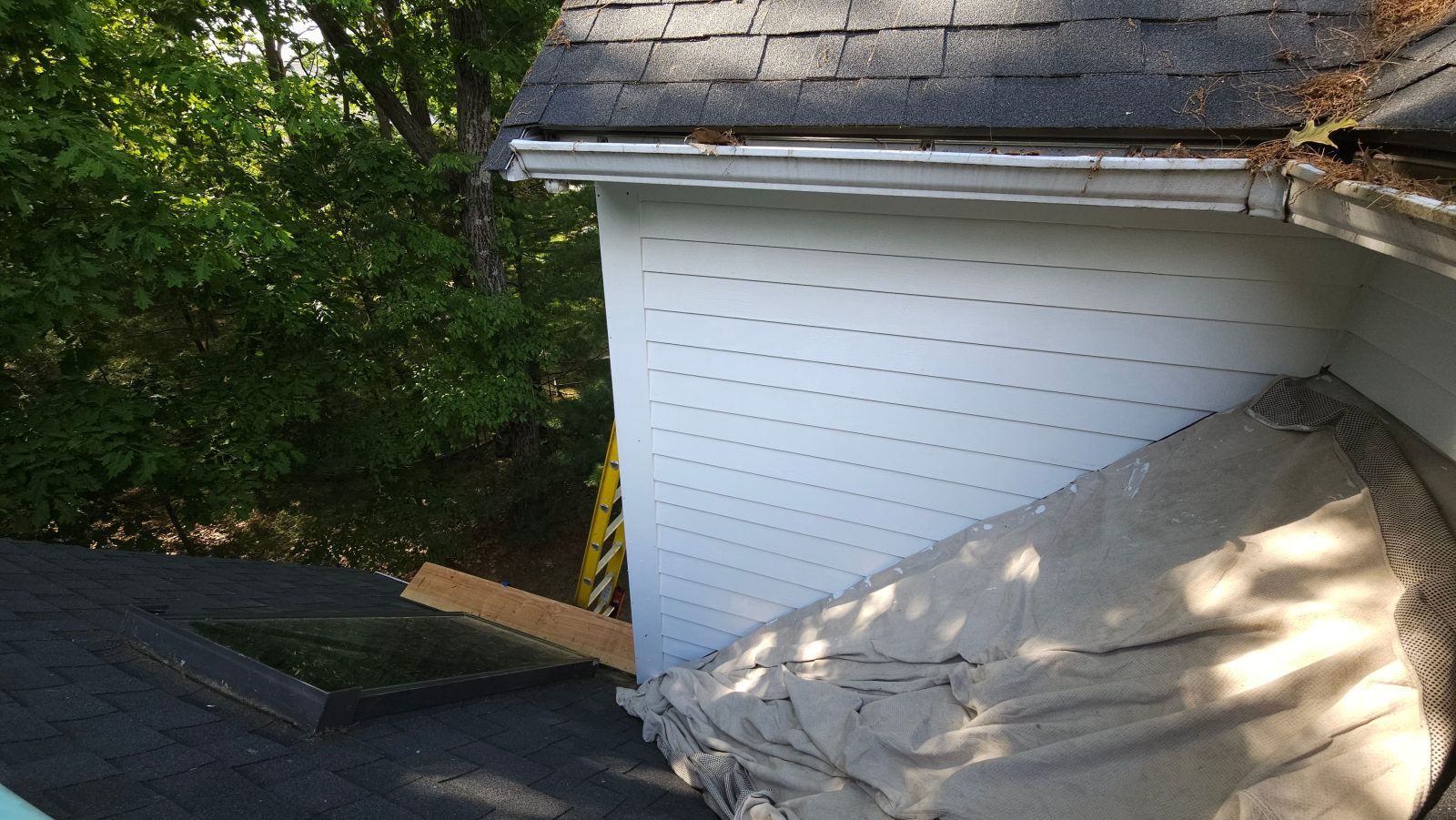 Completed exterior restoration with fresh white paint and new gutters — Weston, MA
